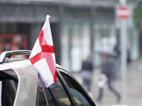 Flags can be flown from cars so long as they don’t obscure the driver’s view or pose a danger to pedestrians and other road users. (Danny Lawson/PA)