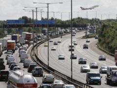Highest earners travel more than lower earners, creating far more transport emissions, the IPPR think tank has warned (Steve Parsons/PA)