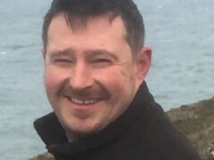 Hywel Morgan died after rescuing a group of children caught in a riptide (Dyfed-Powys Police/PA)