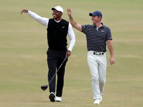 Rory McIlroy, right, has denied rumours of a fallout with Tiger Woods (Richard Sellers/PA)