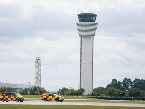 Fire and rescue vehicles drive on Dublin Airport’s north runway (Brian Lawless/PA)