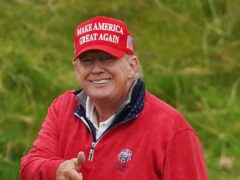 Former US president Donald Trump on the 15th hole at Trump International Golf Links & Hotel in Doonbeg, Co. Clare, during his visit to Ireland (Brian Lawless/PA)