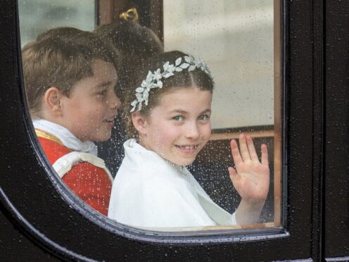 Princess Charlotte and Prince George on the day of the King’s coronation last May (Joe Giddens/PA)
