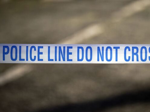 Stock image of police tape (Peter Byrne/PA)