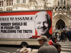 Supporters outside the Royal Courts of Justice during the two-day hearing in the extradition case of WikiLeaks founder Julian Assange (PA)