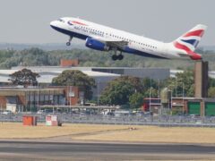 The owner of British Airways has said its earnings have soared in recent months (Jonathan Brady/PA)