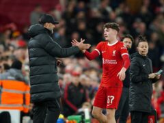 Lewis Koumas, pictured being congratulated by Jurgen Klopp after scoring on his Liverpool debut in February, is in line to win his first Wales cap next week (Peter Byrne/PA)