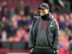 Liverpool manager Jurgen Klopp hopes the pressure being off his players will help them find form in their final three matches (Martin Rickett/PA)