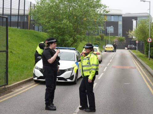 Police outside the Birley Academy in Sheffield, South Yorkshire, where a 17-year-old boy was arrested on suspicion of attempted murder (Dominic Lipinski/PA)