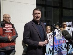 North Belfast Sinn Fein MP John Finucane speaks during a Time for Truth and Justice protest (Liam McBurney/PA)