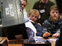 A ballot box is emptied during the count for the Blackpool South by-election at Blackpool Sports Centre (Peter Byrne/PA)