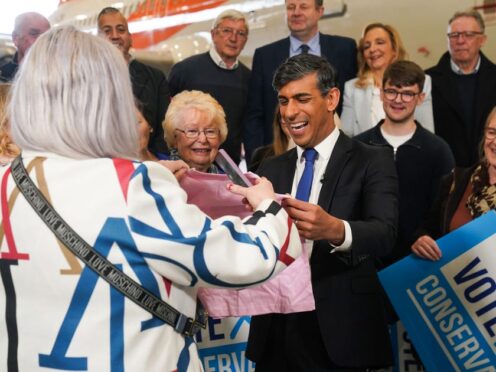 Prime Minister Rishi Sunak greets supporters in Teesside celebrating Lord Ben Houchen’s re-election as Tees Valley mayor (Owen Humphreys/PA)