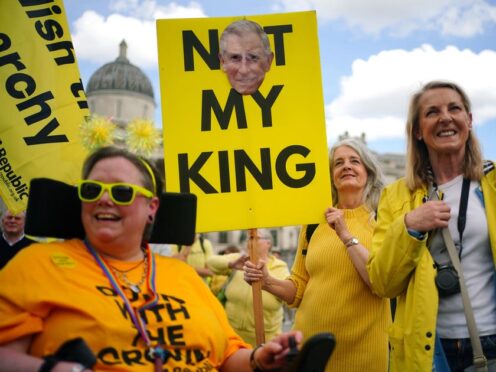 People take part in a rally by anti-monarchy pressure group Republic in Trafalgar Square (Victoria Jones/PA)