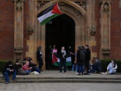 Members of the Queen’s University Belfast Palestine Assembly hold a ‘sit in’ (Niall Carson/PA)