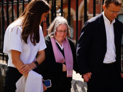 Auriol Grey leaving the Royal Courts of Justice in London (Victoria Jones/PA)