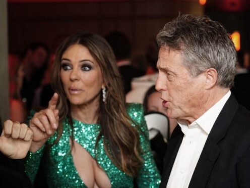 Elizabeth Hurley and Hugh Grant arriving for a special screening of Damian Hurley’s Strictly Confidential (Ian West/PA)