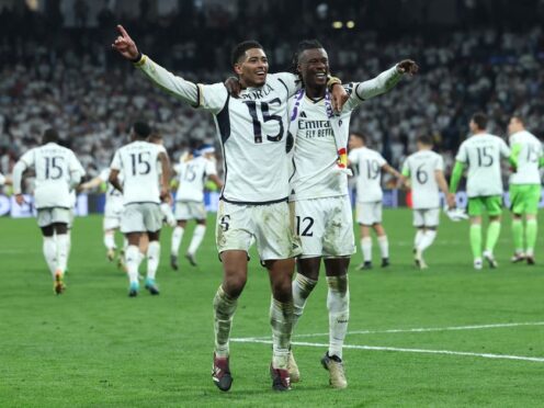 Jude Bellingham, left, and Eduardo Camavinga celebrate as Real Madrid now target a 15th European Cup title at Wembley on June 1 (Isabel Infantes/PA)