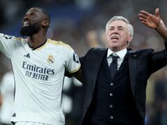 Real Madrid manager Carlo Ancelotti celebrates with Antonio Rudiger (left) and Vinicius Junior after their Champions League semi-final win over Bayern Munich. (Isabel Infantes/PA)
