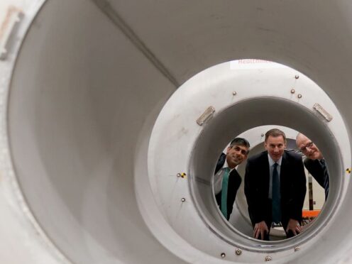 Mr Sunak was joined by the Chancellor on the visit (Jacob King/PA)