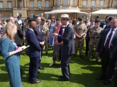 The Duke of Edinburgh greets Gold Award holders and members of their families (Jordan Pettitt/PA)