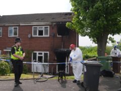 Police and forensic officers at the scene in Dunstall Hill area of Wolverhampton (Jacob King/PA)