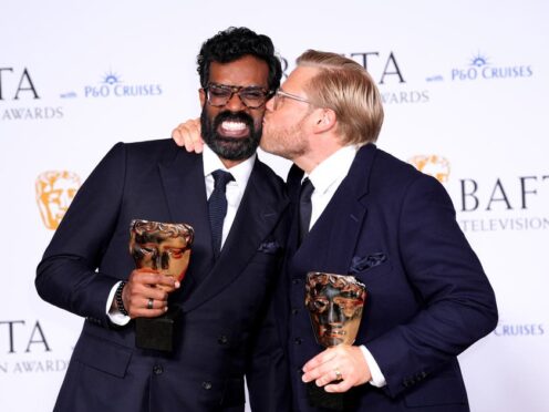 Romesh Ranganathan and Rob Beckett in the Bafta press room with their comedy entertainment award for Rob & Romesh Vs (Ian West/PA)