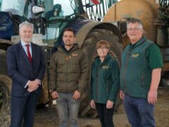 Rural Affairs Secretary Huw Irranca-Davies with farmer Richard Anthony (Welsh Government/PA)