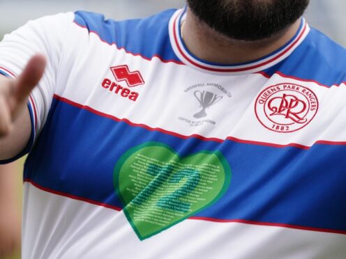 Detail of a player’s shirt during the football match between Grenfell bereaved and survivors, at QPR’s Loftus Road (Aaron Chown/PA)