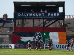 Players from the Palestine women national team warm up for their friendly match at Dalymount Park in Dublin against Bohemians Women (Brian Lawless/PA)