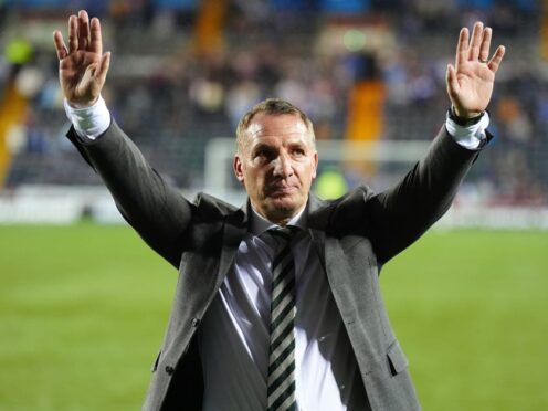 The Celtic manager celebrates after clinching the title (Jane Barlow/PA)