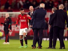 Manchester United’s Bruno Fernandes and manager Erik ten Hag after the Premier League match at Old Trafford, Manchester. Picture date: Wednesday May 15, 2024.