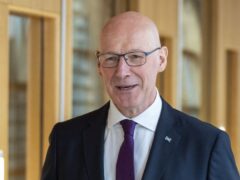 John Swinney said his government would work in partnership with business and trade unions to boost economic growth (Jane Barlow/PA)