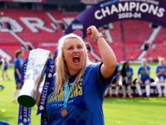 Chelsea manager Emma Hayes celebrated with the trophy (Martin Rickett/PA)