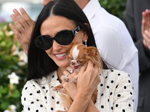 Demi Moore and her dog Pilaf at the photocall for The Substance during the Cannes Film Festival in France (Doug Peters/PA)