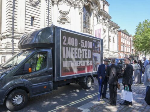 A van carrying a message about infected blood victims outside Central Hall in Westminster (Jeff Moore/PA)