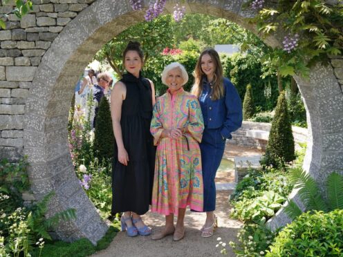 Bridgerton cast members Ruth Gemmell and Hannah Dodd with Mary Berry in the Bridgerton Garden (Jonathan Brady/PA)