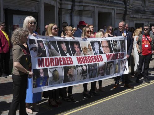 Victims and campaigners outside Central Hall (Jeff Moore/PA)