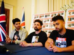 (L-R) Ilay David, brother of hostage Evyatar David, Gal Gilboa Dalal, Nova survivor and brother of Guy Gilboa Dalal, and Amit Levy, brother of Naama Levy, speaking at the Embassy of Israel in London (Victoria Jones/PA)