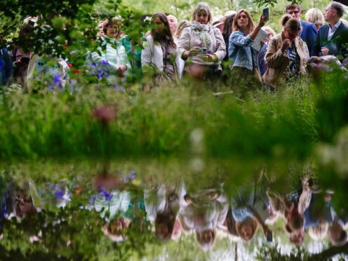 Guests view the Forest Bathing Garden, winner of the RHS Chelsea Best in Show, designed by first- time competitor Ula Maria (Victoria Jones/PA)