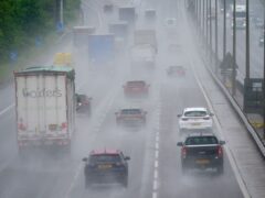 A general view of motorists in rain on the M5 northbound (David Davies/PA)