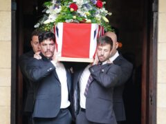 Former colleagues of Mr Henderson carry his coffin (Ben Birchall/PA)