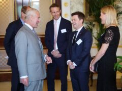 The King meets Declan Donnelly and Ali Astall during a reception for Prince’s Trust Award 2024 winners, supporters and ambassadors at Buckingham Palace in London (Chris Jackson/PA)