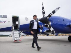 Prime Minister Rishi Sunak arrives at Inverness Airport (PA)