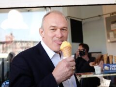 Liberal Democrat leader Sir Ed Davey enjoyed an ice cream on the promenade in Eastbourne (Aaron Chown/PA)
