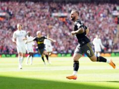 Adam Armstrong celebrates after scoring the winner for Southampton against Leeds at Wembley (Adam Davy/PA)
