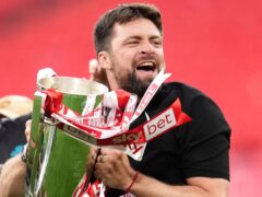 Southampton manager Russell Martin celebrates his side’s promotion after beating Leeds in the play-off final (Adam Davy/PA)