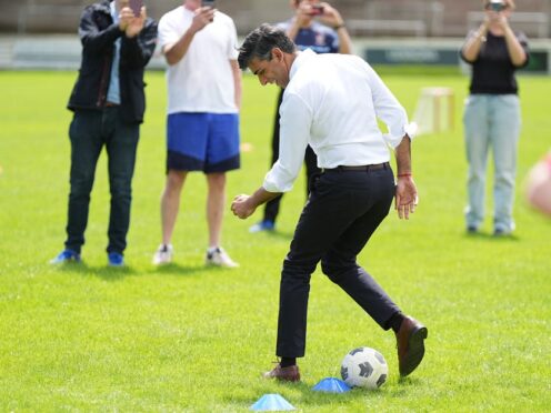Prime Minister Rishi Sunak during his visit to Chesham United Football Club (Aaron Chown/PA)
