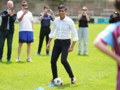 Prime Minister Rishi Sunak during his visit to Chesham United football club (Aaron Chown/PA)