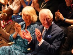 The King and Queen watch an extract of a play performed by third year acting students in the Gielgud Theatre during a visit to Rada in London, to celebrate the school’s 120th anniversary (Jordan Pettitt/PA)