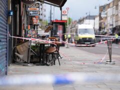 Police at the scene of a shooting at Kingsland High Street, Hackney, east London (James Manning/PA)
